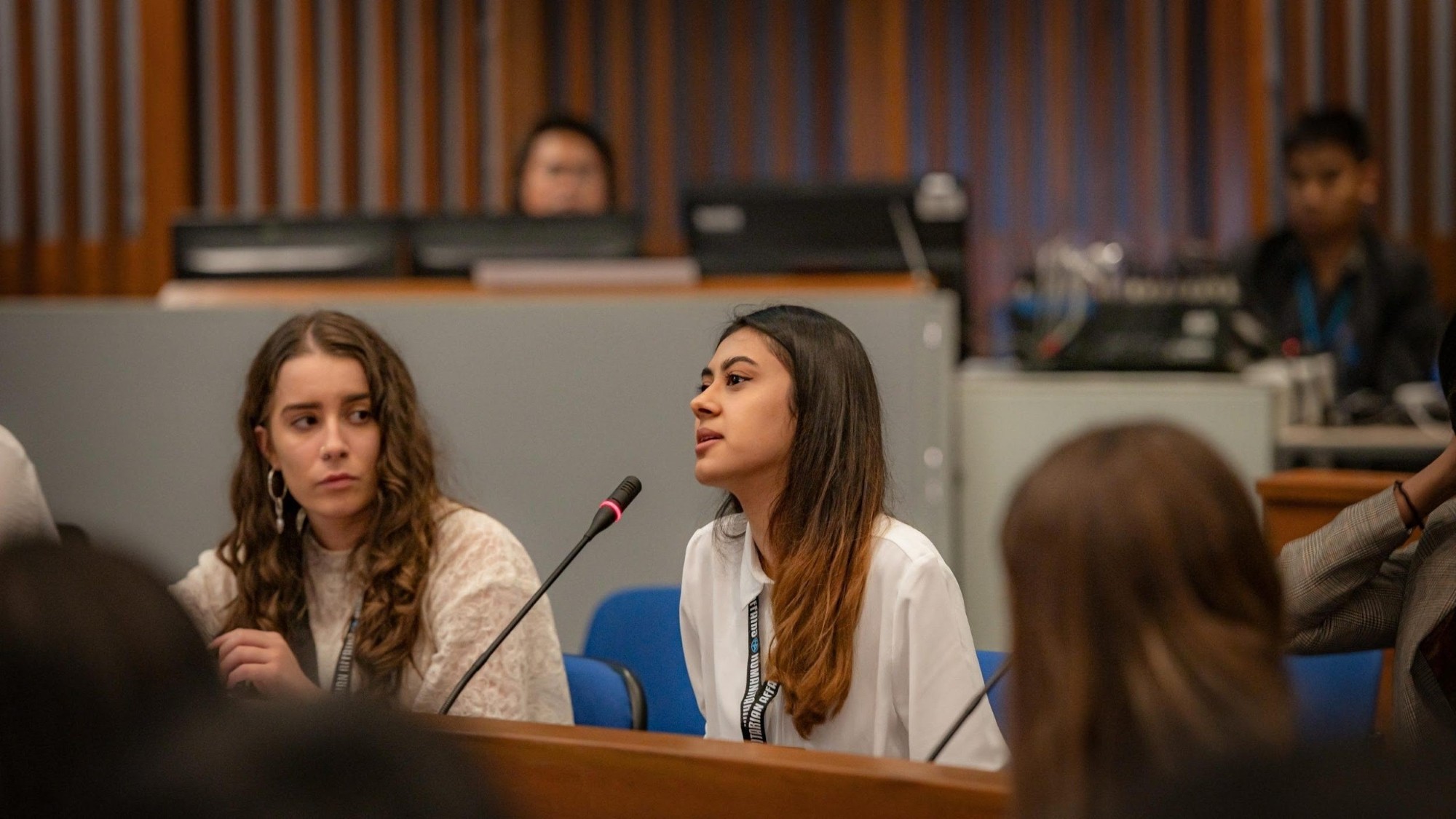 Photo of Alya speaking at the Summit