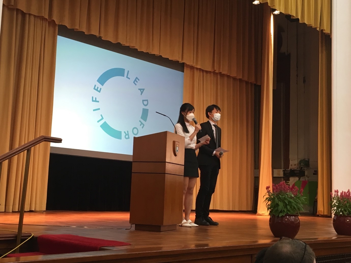 Justin (on the right) being the emcee of the Lead for Life Student Orientation Launch
