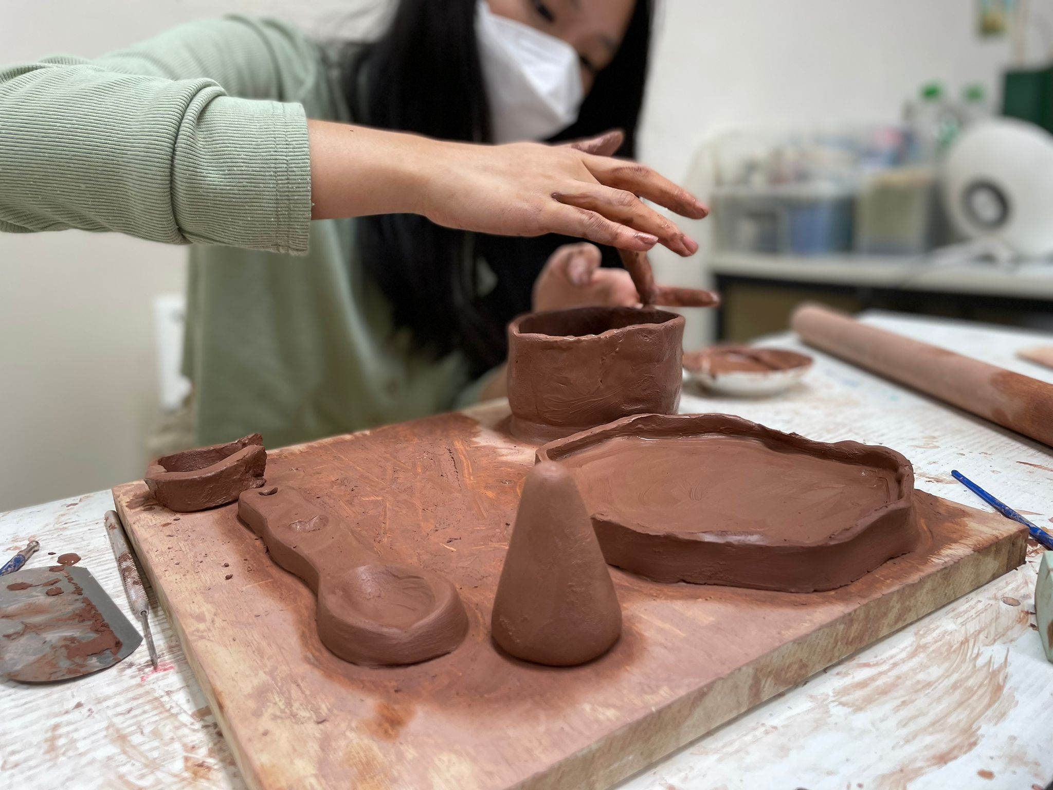 Students are participating in a clay workshop.